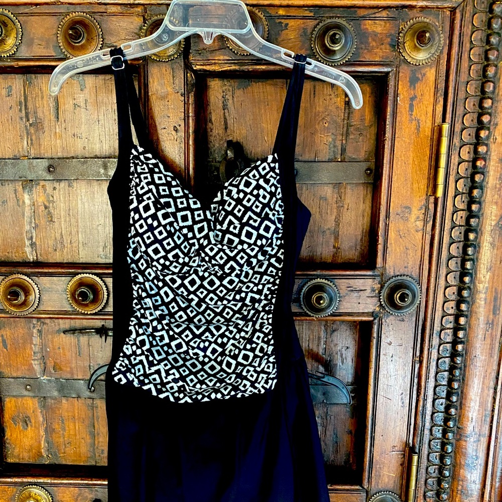 One piece bathing suit with attached skirt